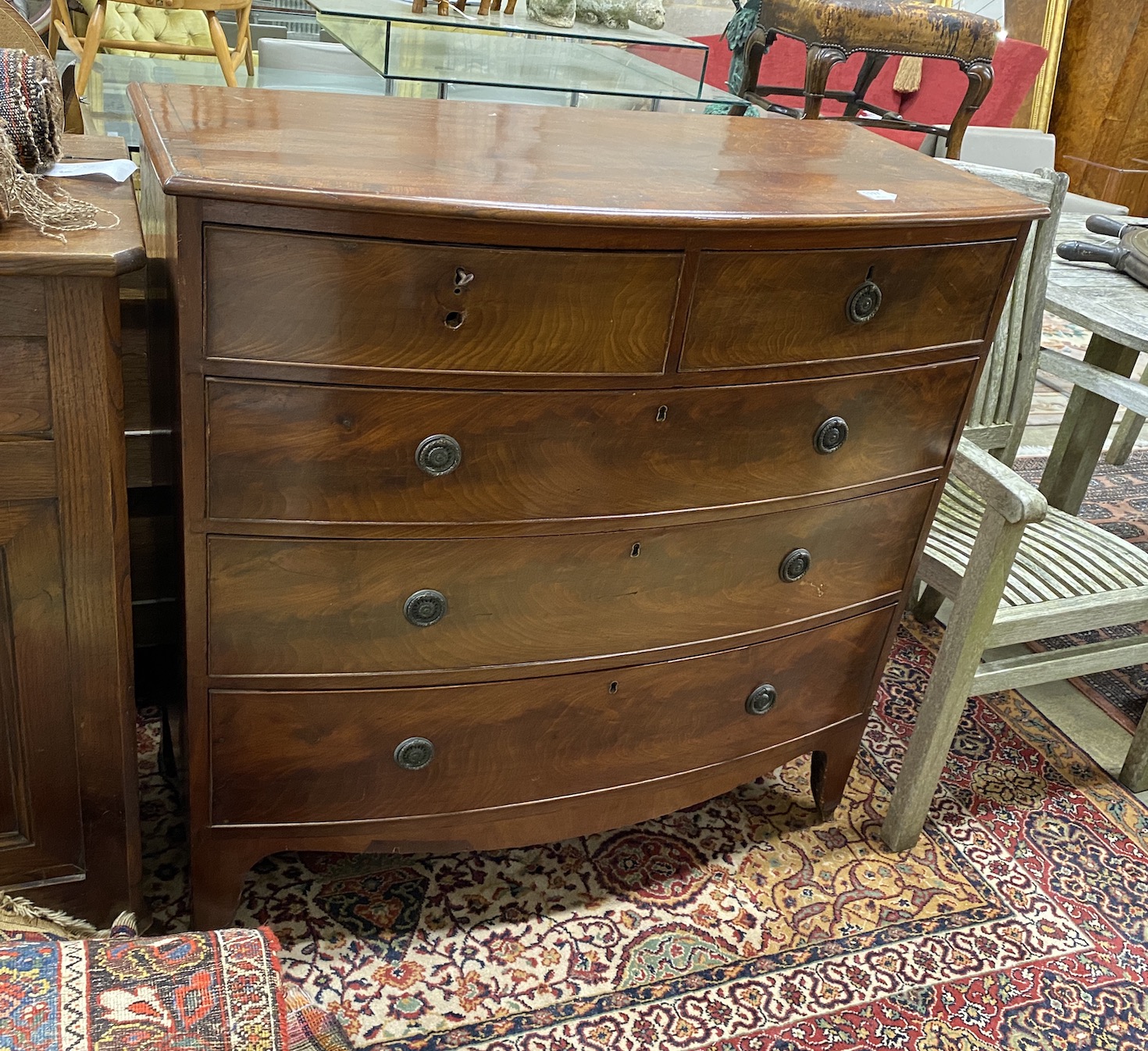 A Regency mahogany bow front chest, width 106cm, depth 51cm, height 105cm